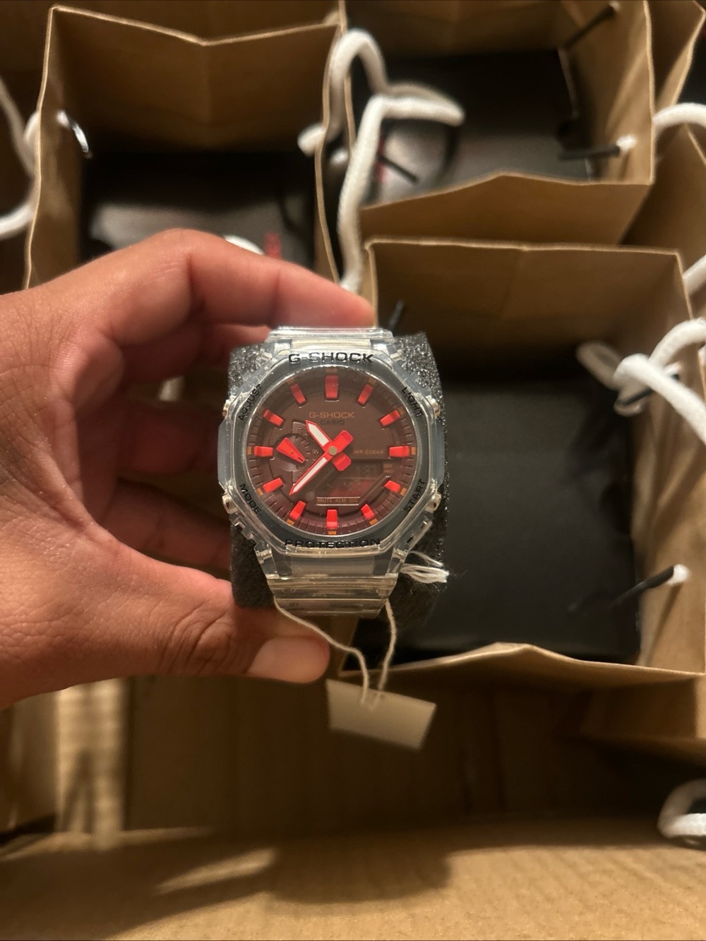 G-Shock Transparent Case Watch with Red Dial Accents